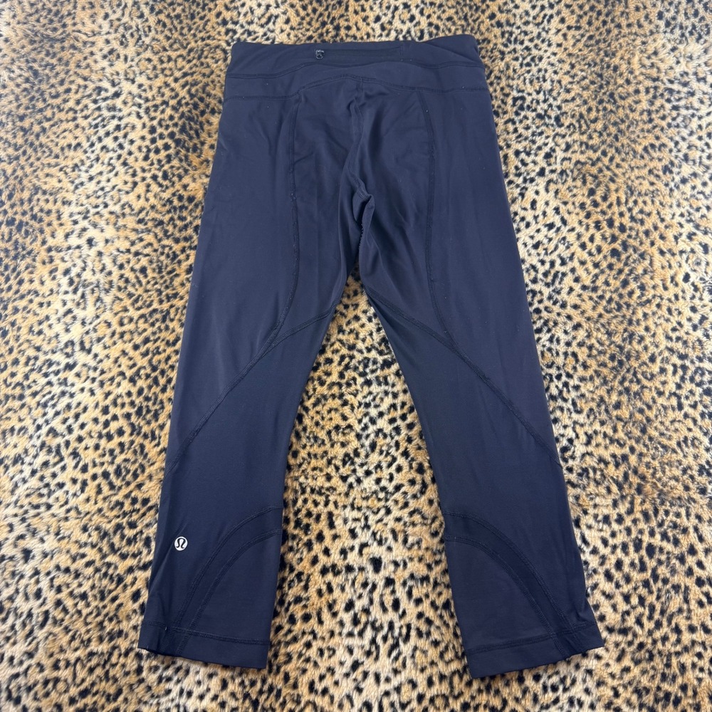 Lululemon Run Inspire Crop II Black Leggings Size 6 Zipper Pocket Mesh